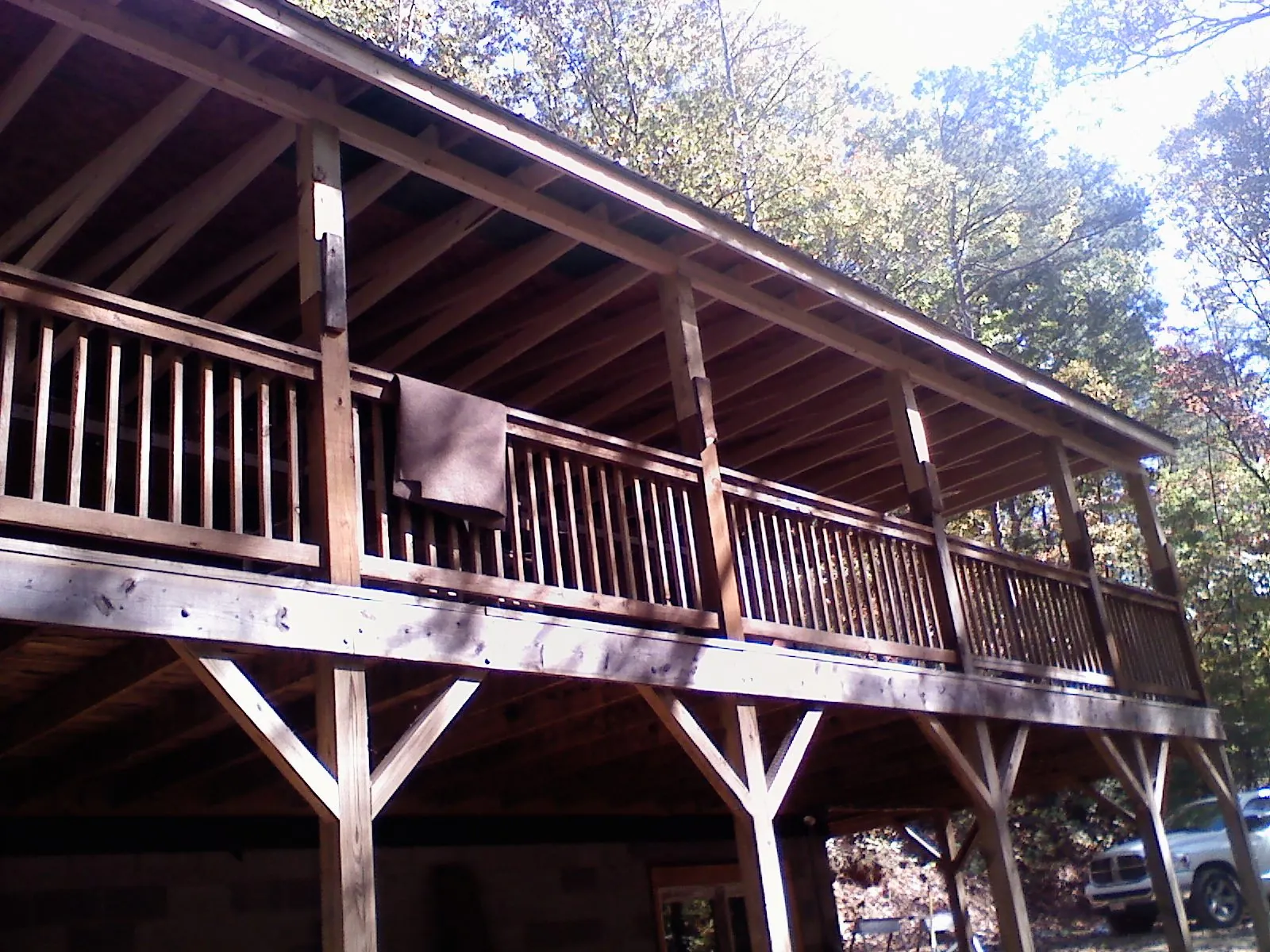 Timber framing under a new elevated porch and deck — Roof Leak Repair in Sullivan by Roofing Brothers